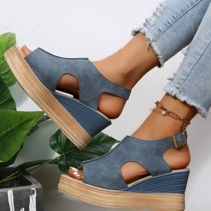 Sandales à bout ouvert , à talons compensés et à boucle